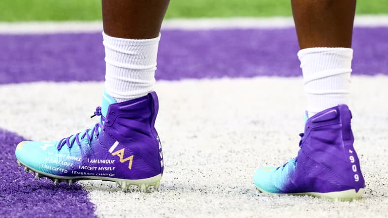 Close-up of Alexander Mattison’s custom Vikings cleats before Jets game.