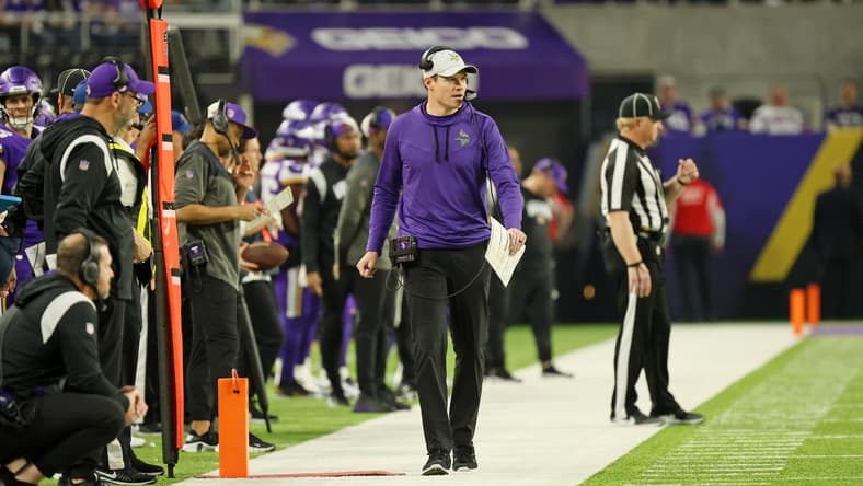 Kevin O’Connell stands on the sideline during a Vikings playoff game at U.S. Bank Stadium.
