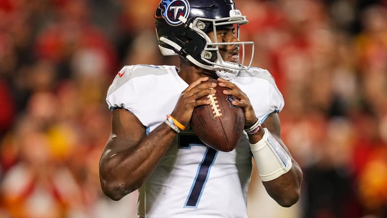 Malik Willis drops back to pass for the Titans against the Chiefs at Arrowhead Stadium.