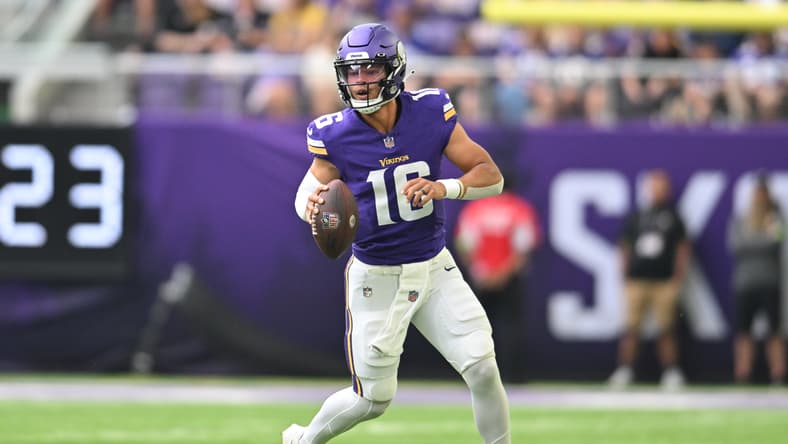 Jaren Hall rolls out to throw during a preseason game against the Cardinals at U.S. Bank Stadium.