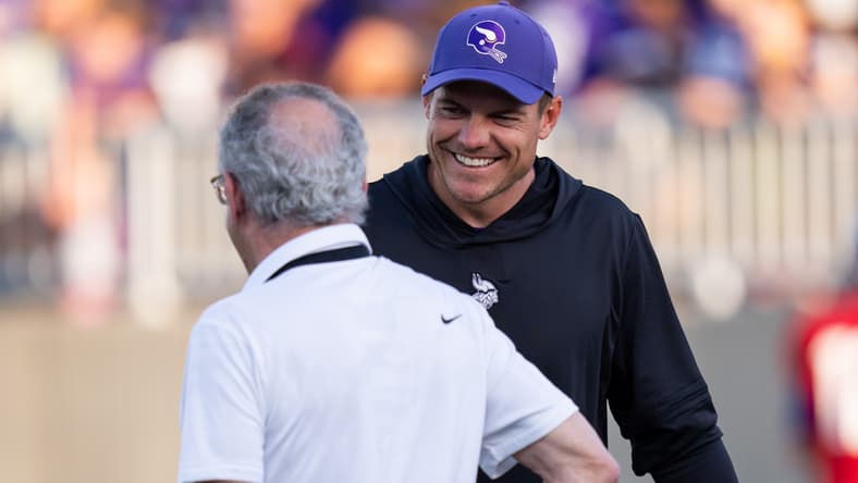 Kevin O’Connell talks with owner Ziggy Wilf during Vikings training camp