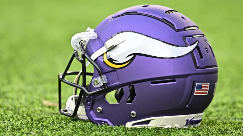 Minnesota Vikings helmet on the field before a 2023 preseason game at U.S. Bank Stadium.