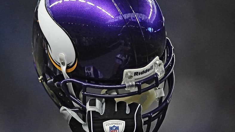 Minnesota Vikings helmet on sideline during game at Ford Field.