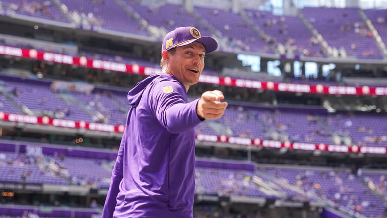 Kevin O’Connell talks with Vikings fans before a preseason game against the Raiders at U.S. Bank Stadium.