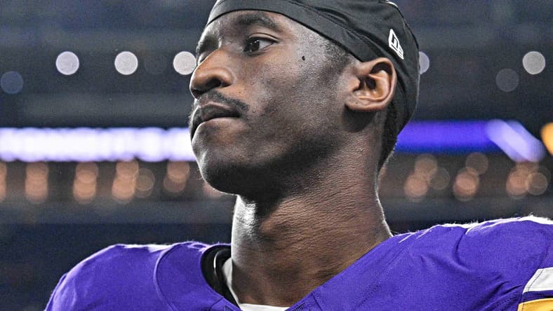 Vikings wide receiver Jordan Addison stands on the field after a game against the San Francisco 49ers at U.S. Bank Stadium.