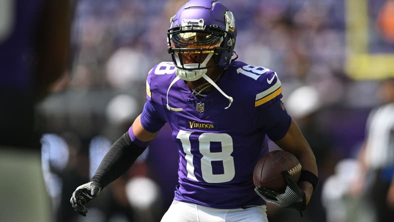 Vikings wide receiver Justin Jefferson warms up before a preseason game against the Raiders. Vikings quarterback battle