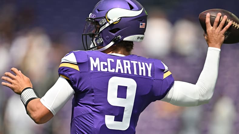 J.J. McCarthy warming up before a Vikings preseason game against the Raiders at U.S. Bank Stadium in Minneapolis.