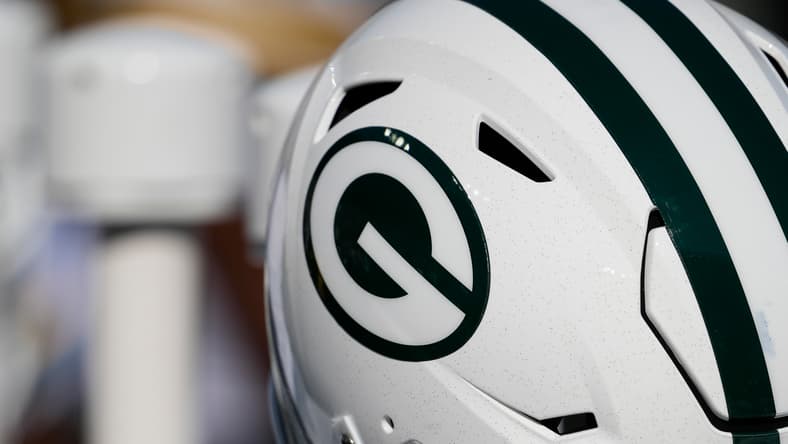 Green Bay Packers helmets on the sideline during the game against the Texans.