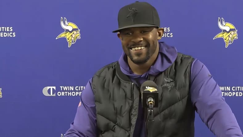 Brian Flores speaks to reporters at the Vikings’ TCO Performance Center.