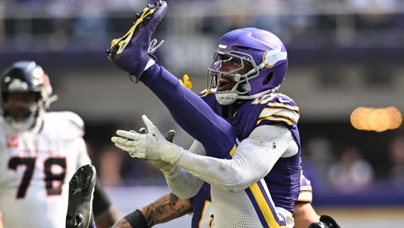 Jonathan Greenard reacts after a sack against the Texans at U.S. Bank Stadium.