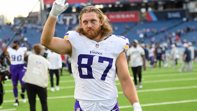 T.J. Hockenson waves to fans during the second half of the Vikings’ game against the Titans in Nashville.