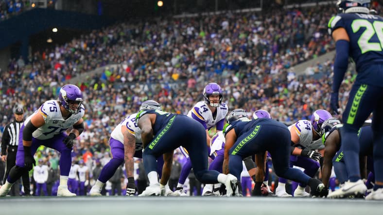 Sam Darnold leads the offense during first-half play in Seattle.