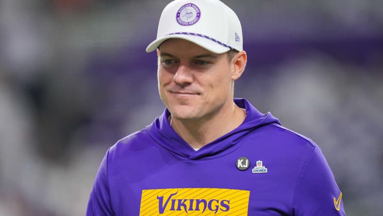 Kevin O’Connell walks on the field before a Vikings game at U.S. Bank Stadium.