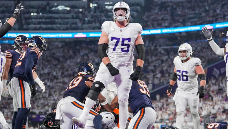 Brian O’Neill celebrates with Cam Akers after a touchdown against the Chicago Bears.