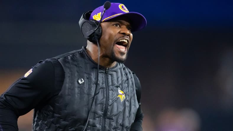 Vikings defensive coordinator Brian Flores on the sideline during an NFC wild card game