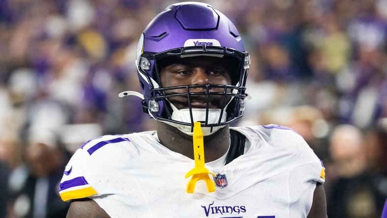 Minnesota Vikings defensive lineman Jalen Redmond lines up against the Los Angeles Rams during an NFC Wild Card playoff game. Kyler Murray
