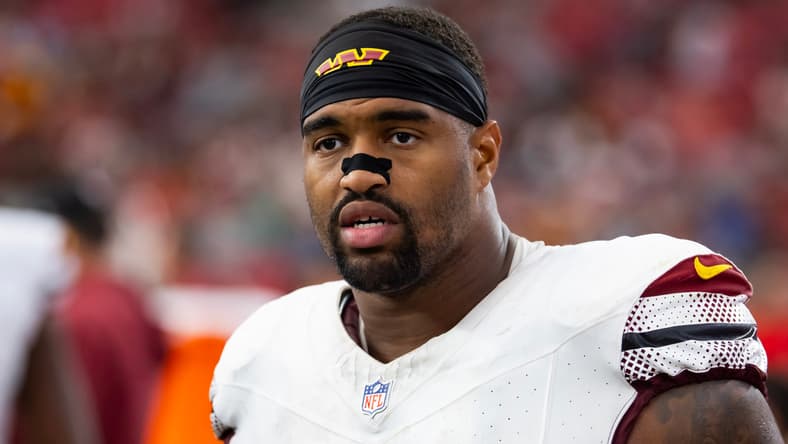 Jonathan Allen gets ready on defense during the Commanders’ road game against the Cardinals in Arizona. Vikings lost this offseason