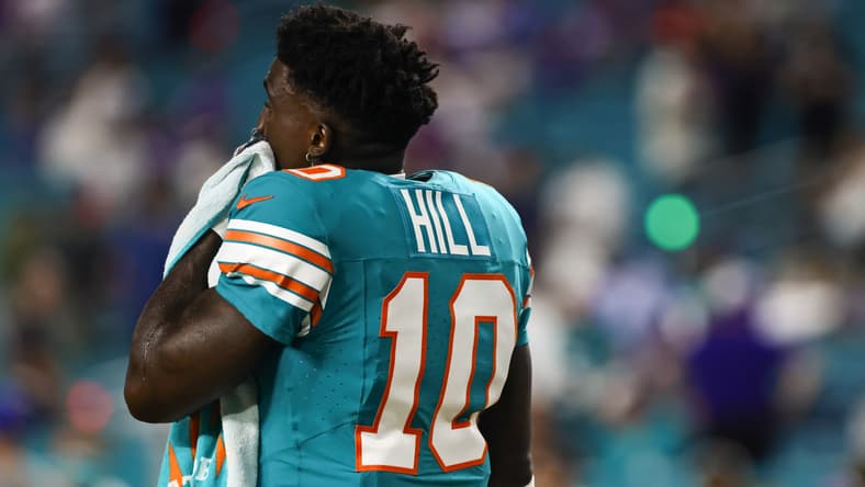 Tyreek Hill on field before Dolphins game against Bills at Hard Rock Stadium.