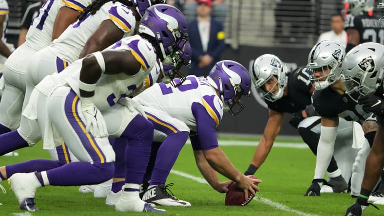Andrew DePaola snaps the ball during a preseason game against the Las Vegas Raiders.