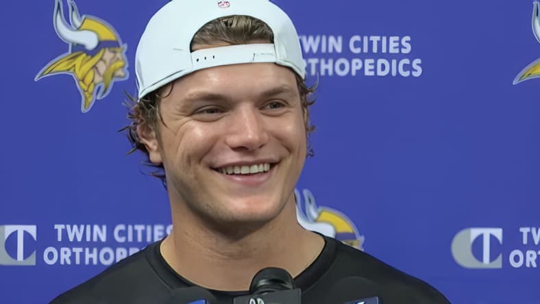 J.J. McCarthy talks with reporters during Vikings OTAs at TCO Performance Center.