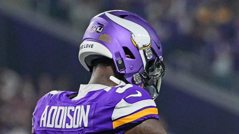 Jordan Addison and Sam Darnold celebrate Vikings touchdown vs. Packers.