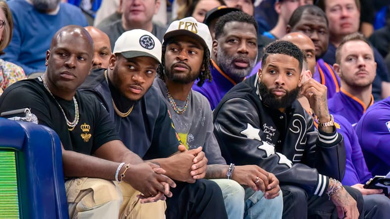 Trevon Diggs, Micah Parsons, and Odell Beckham at an NBA game in 2022