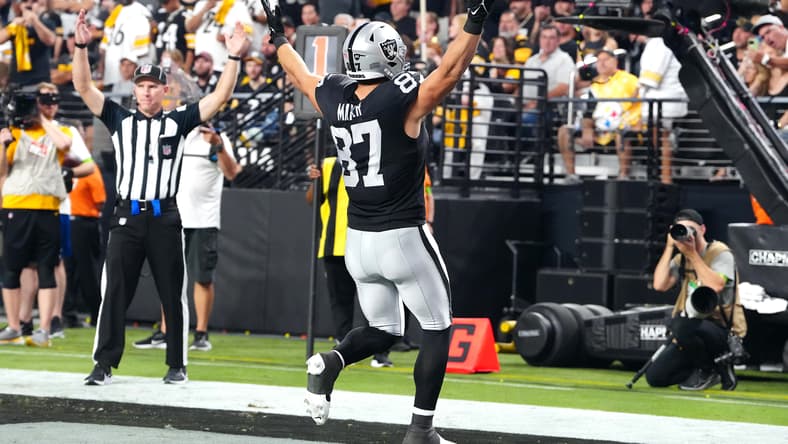 Michael Mayer celebrates after a 2-point conversion during a Raiders game against the Pittsburgh Steelers. Vikings summer surprises