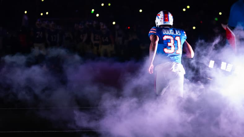 Rasul Douglas stands on the field during a Bills playoff game against the Chiefs.