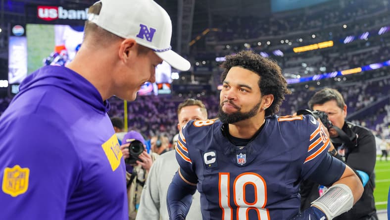 Caleb Williams and Kevin O’Connell talk after the game at U.S. Bank Stadium.