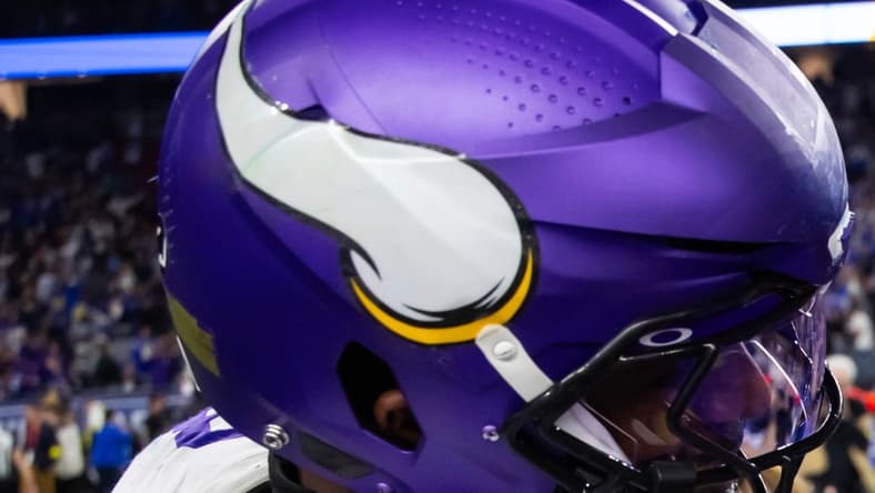 Jonathan Greenard shakes hands with Matthew Stafford after a Vikings playoff game against the Rams.