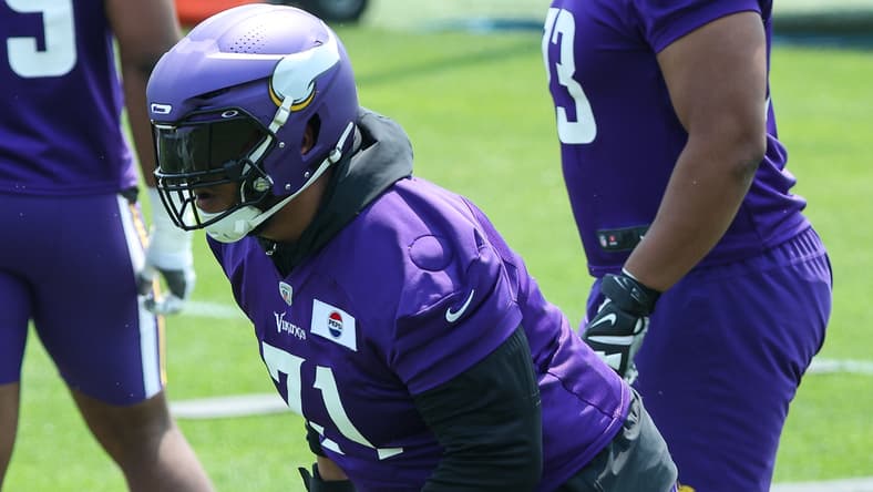 Christian Darrisaw practices at Vikings minicamp on June 10, 2025..