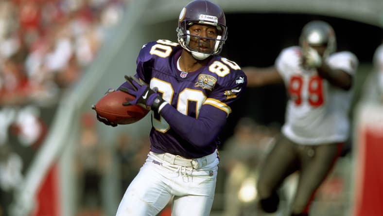 Cris Carter runs a route during a Vikings game against the Buccaneers