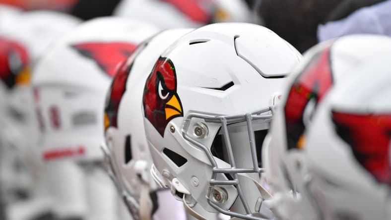 Arizona Cardinals helmets sit on the bench before a game against the Philadelphia Eagles at Lincoln Financial Field.
