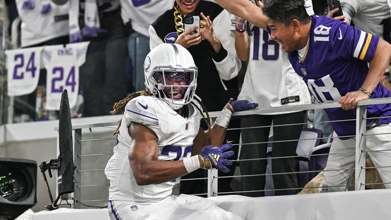 Aaron Jones parties after scoring a touchdown against the Bears at U.S. Bank Stadium. Vikings schedule