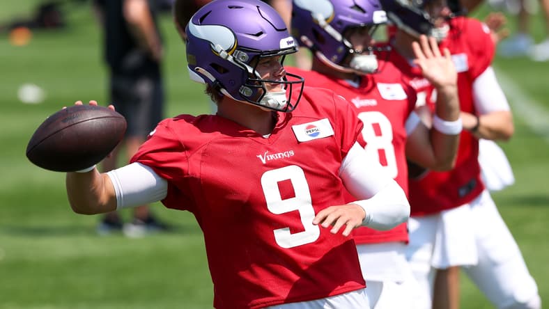 Vikings quarterback J.J. McCarthy participates in drills during training camp at the team facility in Eagan.