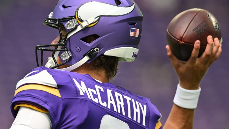J.J. McCarthy warms up before a preseason game against the Houston Texans.