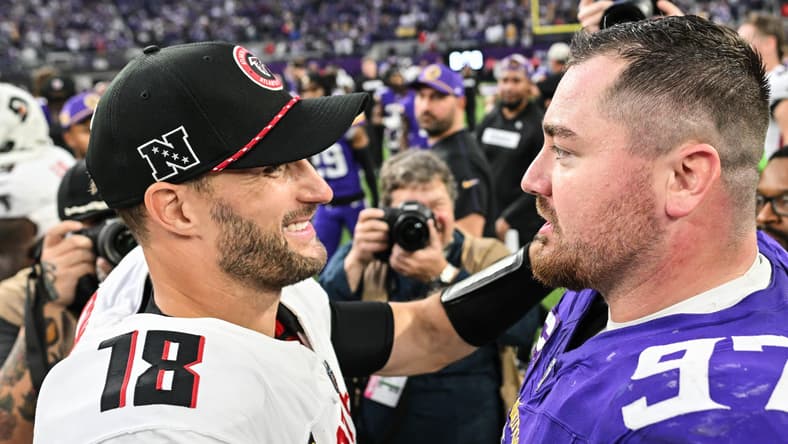 Kirk Cousins and Harrison Phillips, a Vikings DT, in 2024.
