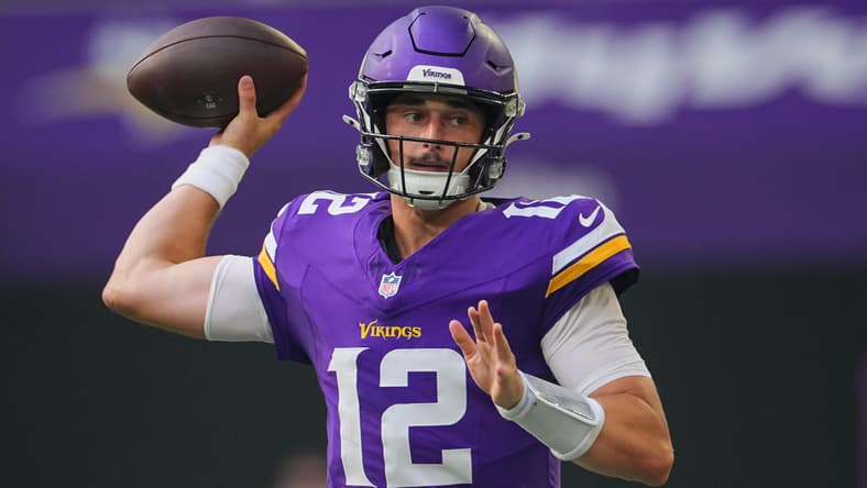 Max Brosmer throws a pass for the Vikings against the Texans.
