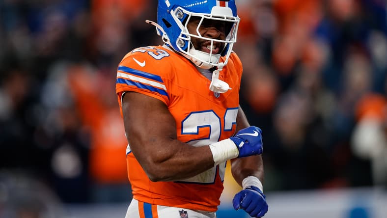 Audric Estime celebrates a touchdown during the Broncos-Chiefs game at Empower Field.