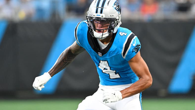 Tetairoa McMillan stands on the field during a Panthers preseason game in Charlotte. Vikings 2026 schedule