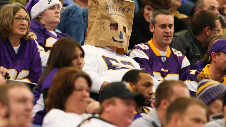 Vikings fan wears a bag over his head during a game against the Saints