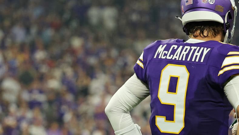 Vikings quarterback J.J. McCarthy speaks with head coach Kevin O’Connell during a game against the Falcons. Vikings quarterback battle