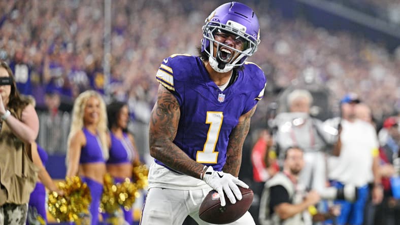 Jalen Nailor celebrates after scoring a touchdown during Vikings vs. Falcons game at U.S. Bank Stadium.