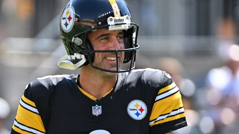 Aaron Rodgers warms up on the field before a Steelers home game against the Seahawks at Acrisure Stadium.