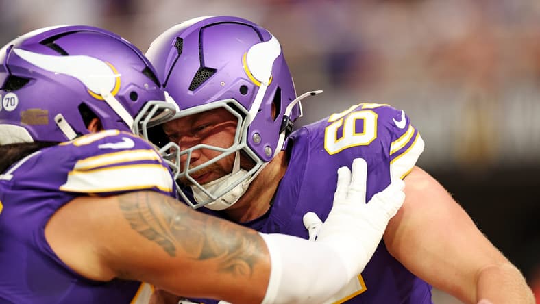 Minnesota Vikings guard Michael Jurgens joins teammates in a pregame huddle before a game against the Atlanta Falcons at U.S. Bank Stadium.