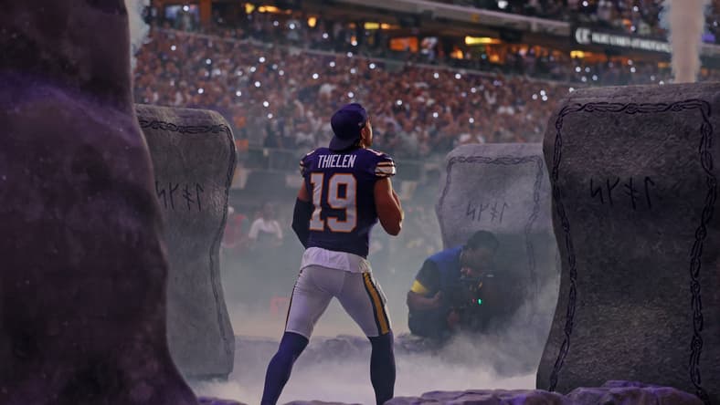 Adam Thielen enters the field before the Vikings’ game against the Falcons at U.S. Bank Stadium.