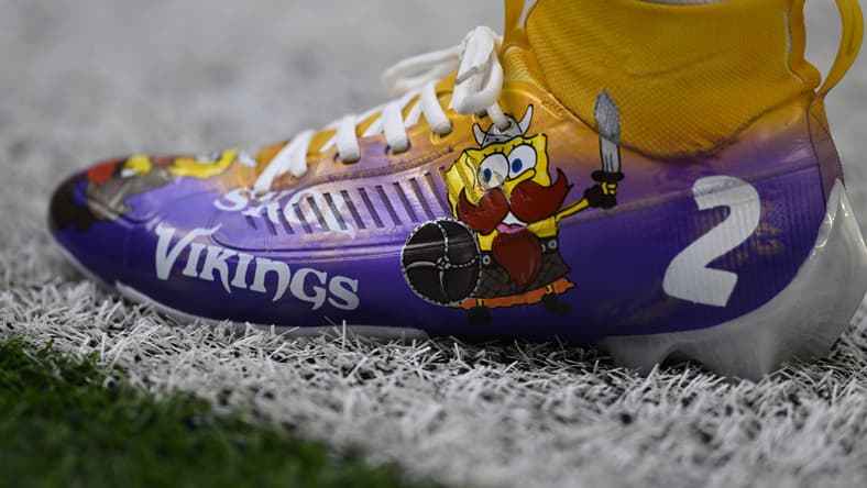 Close-up of Isaiah Rodgers’ cleats before Vikings-Bengals game at U.S. Bank Stadium.