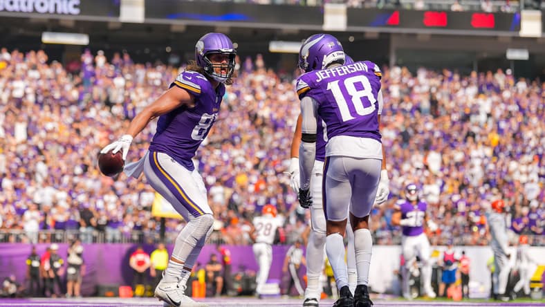 T.J. Hockenson celebrates a touchdown with Justin Jefferson during a Vikings game against the Bengals.