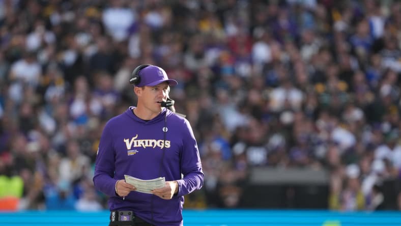 Kevin O’Connell walks sideline during Vikings game vs. Steelers in Dublin.