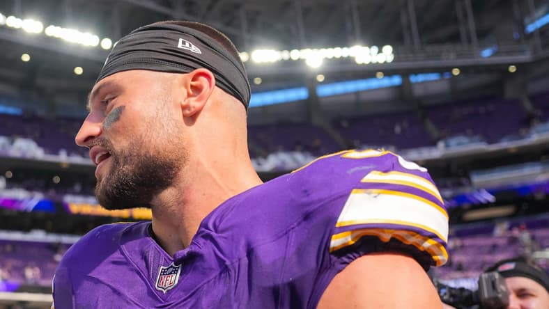 Blake Cashman speaks with C.J. Stroud after the Vikings defeated the Texans at U.S. Bank Stadium.